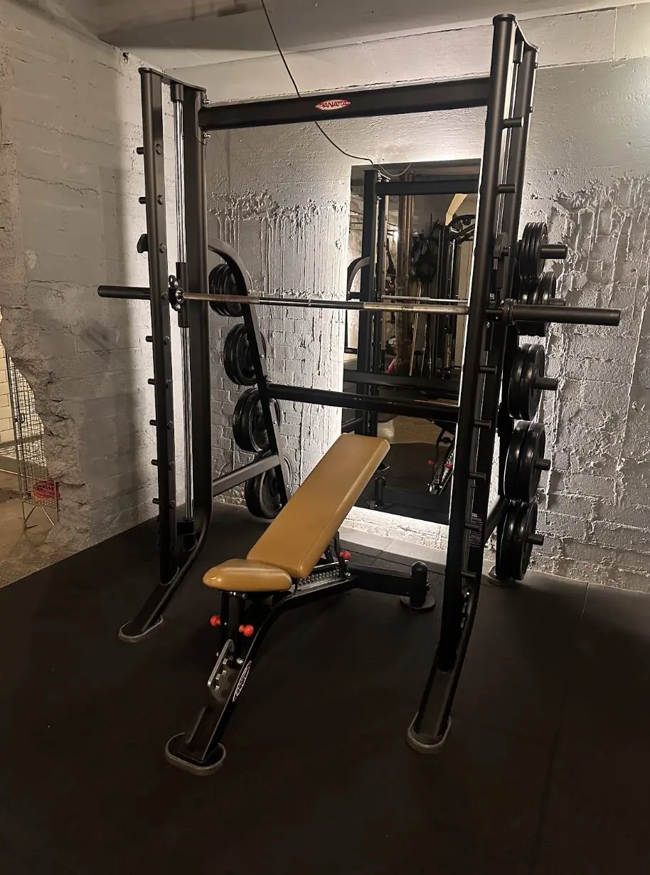 Amor Therapies and State of Change Clinic — Smith machine and bench for strength work.