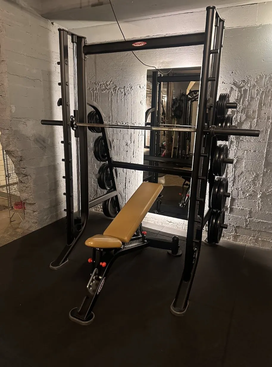 Amor Therapies and State of Change Clinic — Smith machine and bench for strength work.
